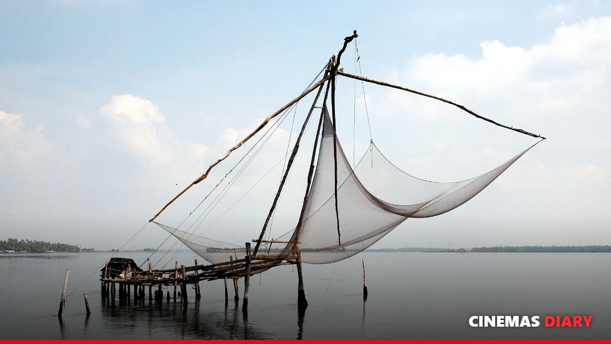 Kochi fishing nets at dusk, evoking the world of Kumbalangi Nights reviewed here